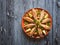 Arabian Fish Kabsa on a dark wooden background.