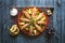 Arabian Fish Kabsa on a dark wooden background.