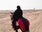 Arabian knight in the desert at sunset, Douz Tunisia, sahara desert