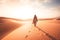 Arabian man walk in the desert sand and dunes at sunset ai generated art