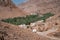 Arabian mountain village of Harat Bidih in the gorge of Wadi Tiwi, Oman. Oasis in a dry, deep desert valley.