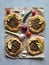 Arabian opened meat pies on gray background.
