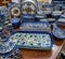 Arabian traditional colored pottery and clocks sold at local store