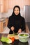 Arabian woman cooking dinner