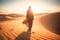 Arabian woman walk in the desert sand and dunes at sunset ai generated art