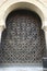 Arabic arch encloses acarved jali screen