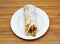 Arabic chicken shawarma roll wrap served in a dish isolated on grey background side view of indian, pakistani food