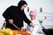 Arabic child in the kitchen with his mother