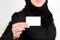 Arabic female hand holding the white businesscard