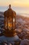 Arabic holiday, ramadan kareem, ramazan, muslim lantern lamp glows on the seashore at sunset