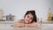 Arabic Little Girl Posing With Glass Of Water In Kitchen