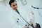 Arabic Male Doctor Checking Blood Pressure Boy
