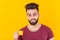 Arabic man drink coffee from small cup on yellow background - people with coffee cup easy lifestyle concept