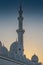 Arabic mosque facade with domes, with sunset light. Great Mosque. UAE. Abu dhabi