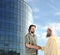Arabic Muslim businessman meeting outdoors