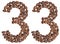 Arabic numeral 33, thirty three, from coffee beans, isolated on