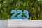 Arabic numerals of 223, two hundred twenty three