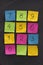 Arabic numerals on sticky notes and blackboard