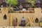 Arabic outdoor kitchen at restaurant decorated with canned food