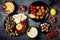 Arabic traditional cuisine. Middle Eastern meze platter with pita, olives, hummus, stuffed dolma, labneh cheese balls, falafel.