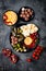 Arabic traditional cuisine. Middle Eastern meze platter with pita, olives, hummus, stuffed dolma, labneh cheese balls in spices.