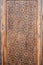 arabic Uzbek Islamic patterns ornament with stars on a modern wooden carved door in Uzbekistan