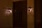 Arabic wooden door at night with decorative light lamps