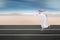Arabic young businessman running on street