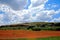 ARABLE FARMLAND FLANKED BY MOUNTAIN