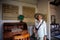 ARACATACA, COLOMBIA - FEBRUARY 1, 2024: Senior woman tourist in the Museum House where the Colombian Nobel Prize of literature