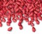 Arachis or peanuts background with red scattered nuts and beans