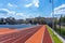 Arad,Arad Romania,April 24 2023: Running track and basketball court in front of the high school