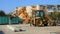 Arad, Romania-November 08, 2019: Yellow JCB industrial excavator working on demolition/construction site