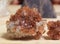 Aragonite Carbonate Crystals With Pyramid in Background