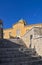 Arahova, Parnassos, Greece, stone steps lead to Agios Georgios & x28;Saint George& x29; church under deep blue sky