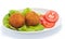 Arancini of rice with salad and tomato