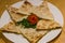 Arayes Flat Lebanese bread stuffed with lamb or chicken minced meat and served with garlic yoghurt sauce
