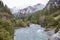 Arazas river in Ordesa y Monte Perdido national park with some snow and fog