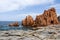 Arbatax red porphyry rocks nearby port Capo Bellavista sardegna Sardinia Italy Europe