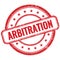 ARBITRATION text on red grungy round rubber stamp