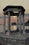 Arbor with Doric columns at sunset by the sea