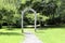 Arbor in the park on gravel footpath