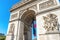 Arc de Triomphe on blue sky in Paris