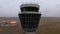 Arc shot of flights management air control tower in international airport