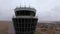 Arc shot of flights management air control tower in international airport