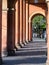 Arcade, Hallway and Columns - orange architecture in Public Square in Parma, Italy