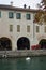 Arcaded building by a canal Treviso, Italy