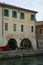 Arcaded building by a canal Treviso Italy