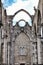 Arcades, pillars and facade of Do Carmo convent in Lisbon