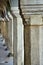 Arcades and stone columns in historic tenement houses